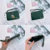 圖片  Coach 限定款 米奇單層 小手拿