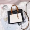 圖片 Marc Jacobs｜MJ 手提鎖頭方包 撞色小托特 斜背包