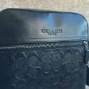 圖片 美國百分百【全新真品】COACH 肩背包 斜背包 男包 側背包 公事包 皮革 拉鍊 凸滿版logo CT55