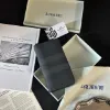 圖片 BURBERRY 經典菱格紋直式拉鏈長夾