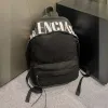 圖片 Balenciaga 827206 男款 Editor 黑白色帆布後背包 黑白配色