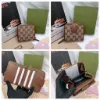 圖片  Gucci 兩折短夾 滿版短夾