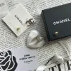 圖片 CHANEL 鑲鑽金色雙C耳環