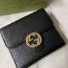 圖片 Gucci 黑金大logo雙面短夾
