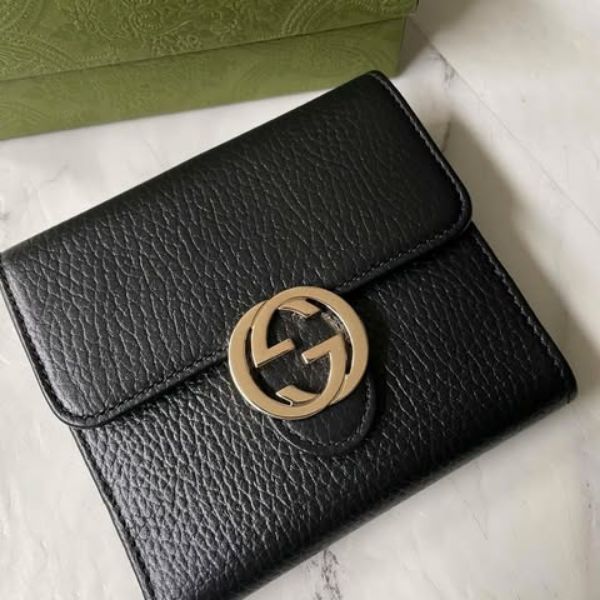 圖片 Gucci 黑金大logo雙面短夾