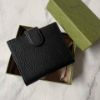 圖片 Gucci 黑金大logo雙面短夾