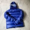 圖片 Moncler 寶藍徽章羽絨外套