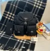 圖片 PRADA Re-Nylon 中號黑色尼龍後背包