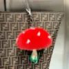 圖片 Fendi 7AS406 拼色皮革與紅色貂毛蘑菇造型吊飾