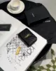 圖片 【YSL】粒面ㄇ字拉鍊對開短夾 黑金