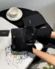 圖片 【YSL】粒面ㄇ字拉鍊對開短夾 黑金