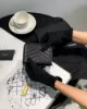 圖片 【YSL】粒面ㄇ字拉鍊對開短夾 黑金
