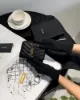 圖片 【YSL】粒面ㄇ字拉鍊對開短夾 黑金