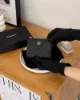 圖片 【CHANEL】荔枝紋L型拉鍊短夾 黑金