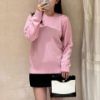 圖片 Chanel 中古粉色書包釦針織衣