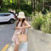 圖片 Celine 櫻花粉凱旋門草編籃子包