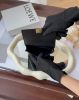 圖片 【LOEWE】ANAGRAM 鵝卵石掀蓋卡包 黑金