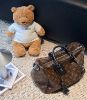 圖片 LV M12243 Speedy Soft 30 Dark Monogram塗層帆布製作 綴以黑色皮革飾邊 配以矚目的歌德式風格鏈帶 是旅行的完美之選