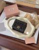 圖片 【MIUMIU】MATELASSE 納帕對開短夾 復古棕色